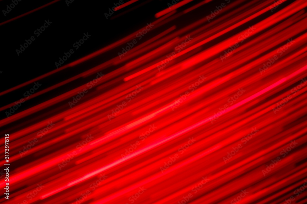 Futuristic blurred lights holiday monochrome background in saturated red and black, perfect for Christmas, New Year, Valentine, party, technology drop. Horizontal, soft focus Futuristic blurred lights holiday monochrome background in saturated red and black, perfect for Christmas, New Year, Valentine, party, technology drop. Horizontal, soft focus