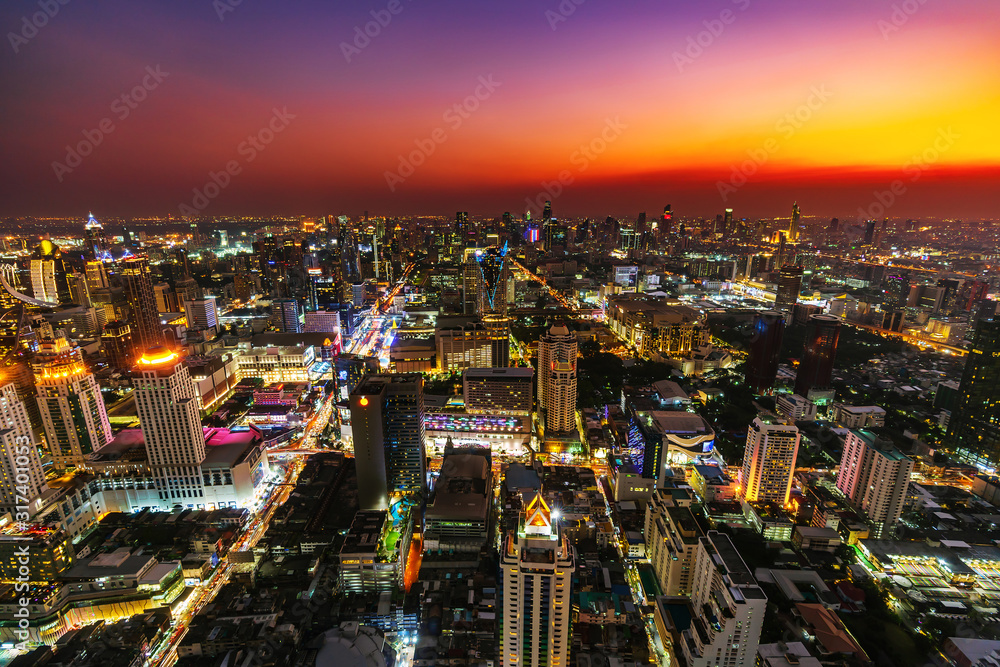 Bangkok city downtown and road traffic at sunset in Thailand