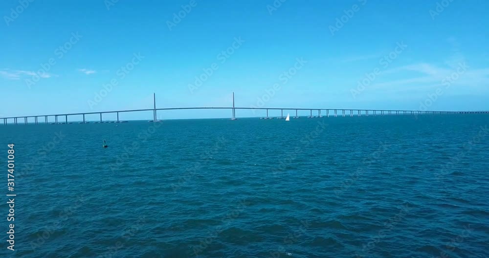 4K Aerial Video of Sailboat Sailing Near Sunshine Skyway Bridge in Florida 4K Aerial Video of Sailboat Sailing Near Sunshine Skyway Bridge in Florida