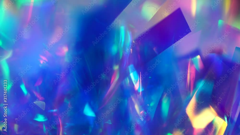 Pink, purple, blue, neon colors abstract vibrant iridescent background. Light through a crystal prism. Psychedelic movement Pink, purple, blue, neon colors abstract vibrant iridescent background. Light through a crystal prism. Psychedelic movement
