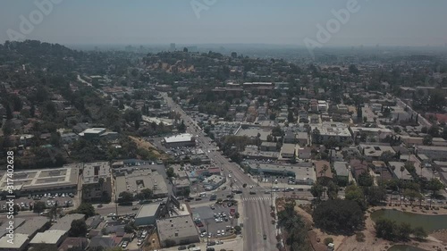 Wallpaper Mural Aerial Drone Of Cars Driving into Los Feliz Area into Burbank Los Angeles California 4K Flying Away from A Smoggy Afternoon Day Torontodigital.ca
