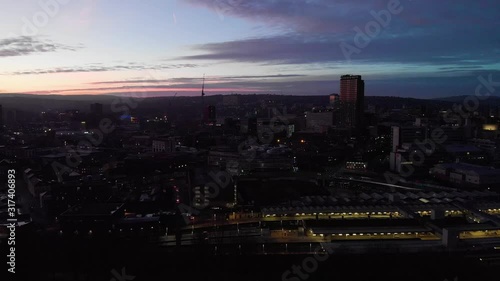 Sheffield City Centre drone shot over the sky line sheffield hallam bramall lane tall sky scraper aerial shot during sunset night shot sun down blue orange purple sky UK city photo