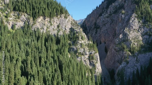 Kaindy lake and fir trees in the Kungei-Alatau mountains. The Northern Tien Shan. Kazakhstan. photo