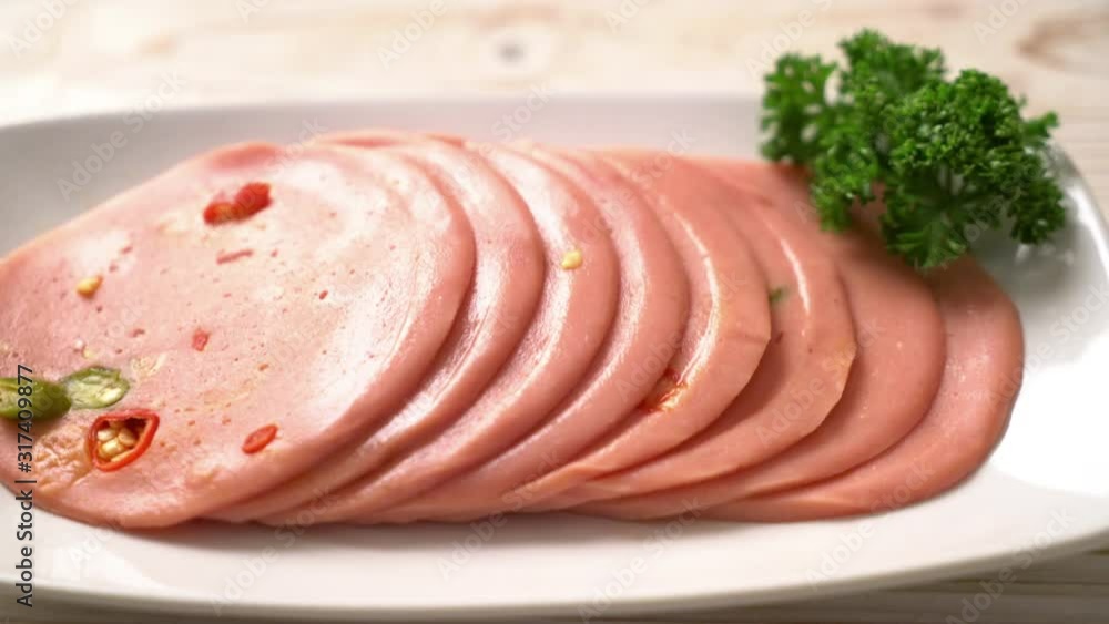 pork bologna with chilli on plate pork bologna with chilli on plate