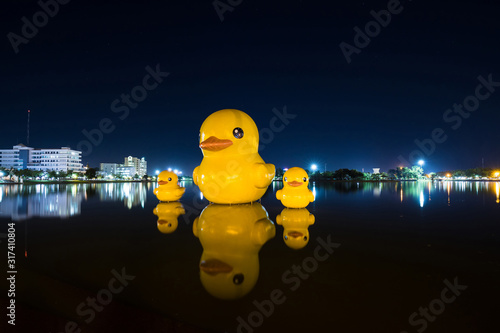 Giant yellow ducks at night  The Giant yellow ducks is the most popular in Nong Prajak public park.