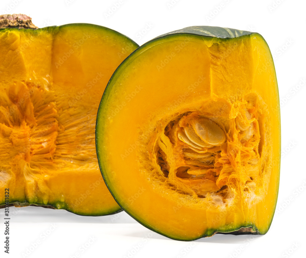 Fresh pumpkin cut into slices, placed on a white background Fresh pumpkin cut into slices, placed on a white background