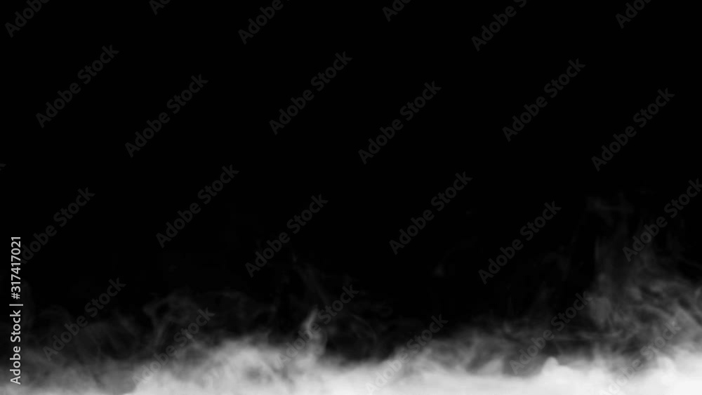 Atmospheric smoke VFX overlay element. Haze background. Smoke in slow motion on black background. White smoke slowly floating through space against black background. Mist effect. Fog effect. Atmospheric smoke VFX overlay element. Haze background. Smoke in slow motion on black background. White smoke slowly floating through space against black background. Mist effect. Fog effect.
