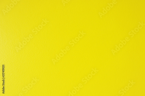 Yellow Texture of concrete wall can use for background