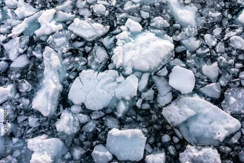 Pack ice floating in the cold water of Antarctica