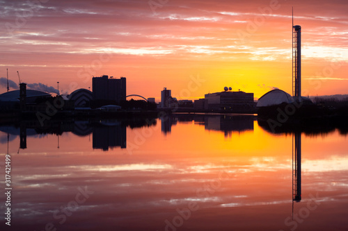 An amazing sunrise over the river Clyde in Glasgow, Scotland on a cold clear winter morning