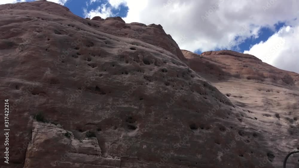 Passing by large beautiful & natural smooth rock formations while traveling across the USA.
Bright sky with thick white clouds. Passing by large beautiful & natural smooth rock formations while traveling across the USA.
Bright sky with thick white clouds.