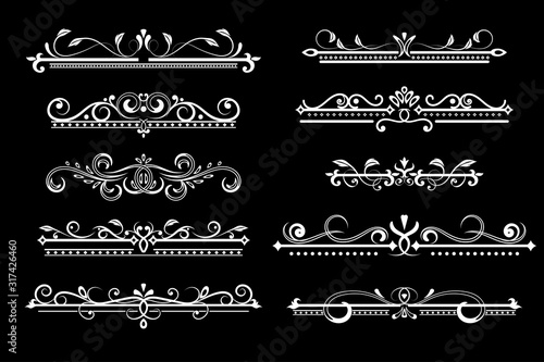 Vintage ornamental dividers. White typographic decorations on black background