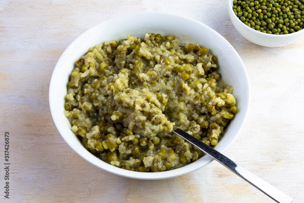 Mung bean with white rice soup which is called Nokdujuk in Korea Mung bean with white rice soup which is called Nokdujuk in Korea