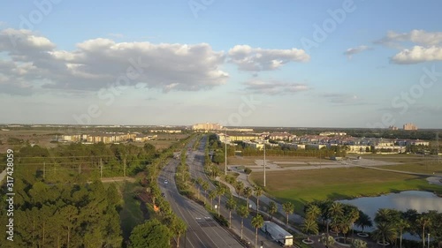 Aerial Drone 4K Sunset Footage View Overlooking Central Florida Tourism and Residential District Universal Blvd Street