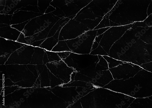 Dark black marble surface with white veins lightning seamless patterns abstract cracked background