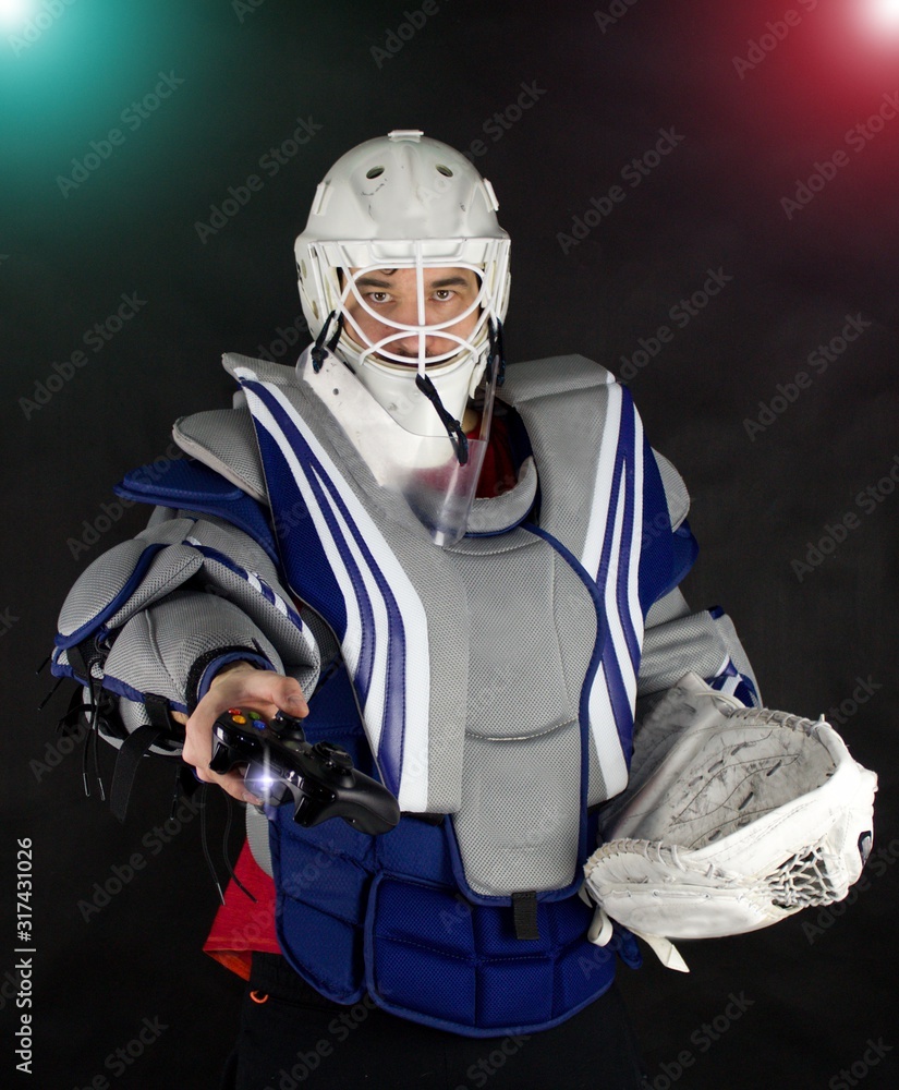 Hockey goalie invites you to play eports.Electronic sports are popular.Hockey goalkeeper gives you a controller from the game console. Let`s play and qualify for the electronic sport Olympics.