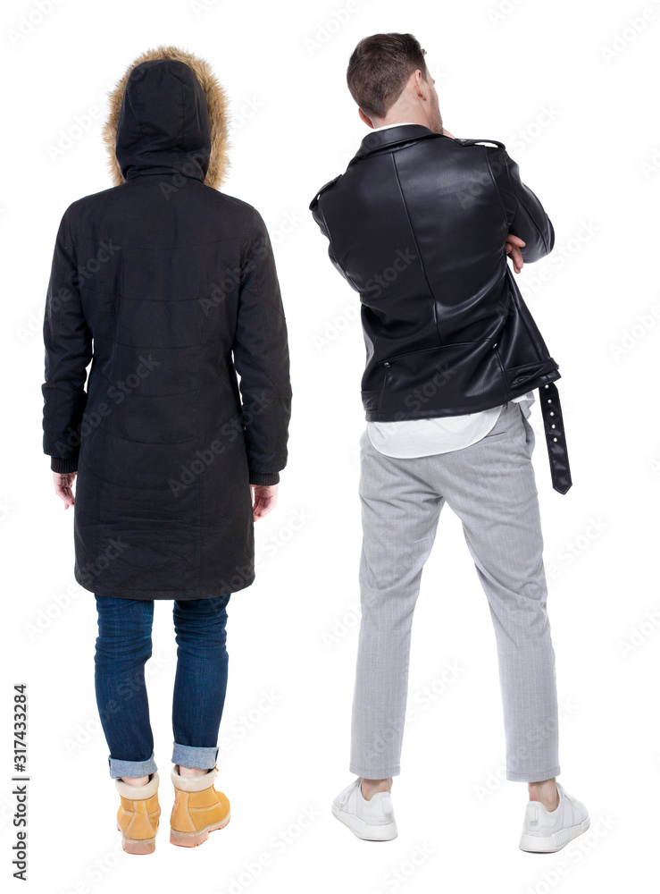 Back view of couple in winter jacket. Back view of couple in winter jacket.