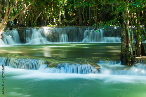 Very nice green waterfall for relaxation, Located Erawan waterfall Karnchanaburi province, Thailand © peangdao