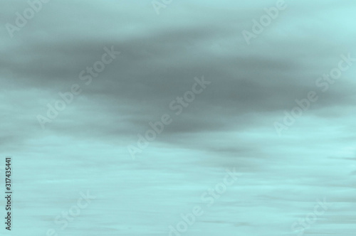 A background with clouds effect with blue tone