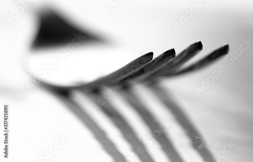 Photo of a fork with shadow