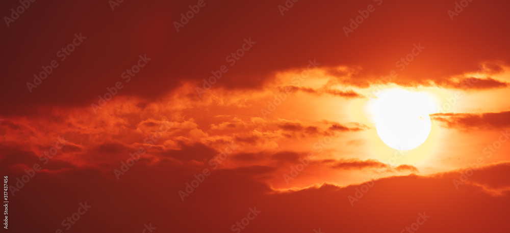 Colorful clouds at dawn of the sun