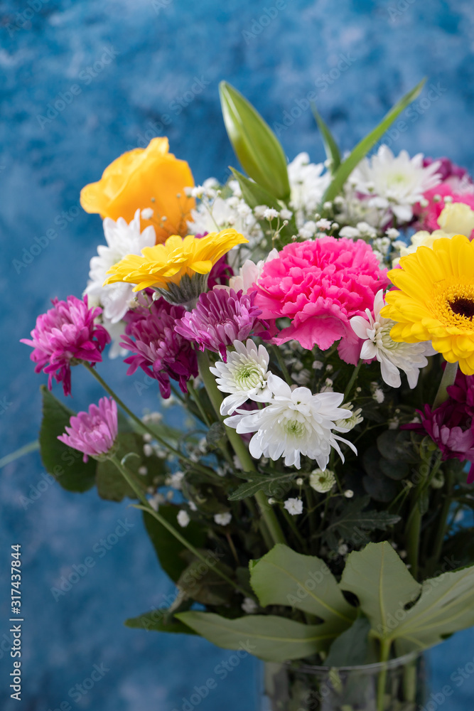 bouquet of beautiful flowers  with blue background