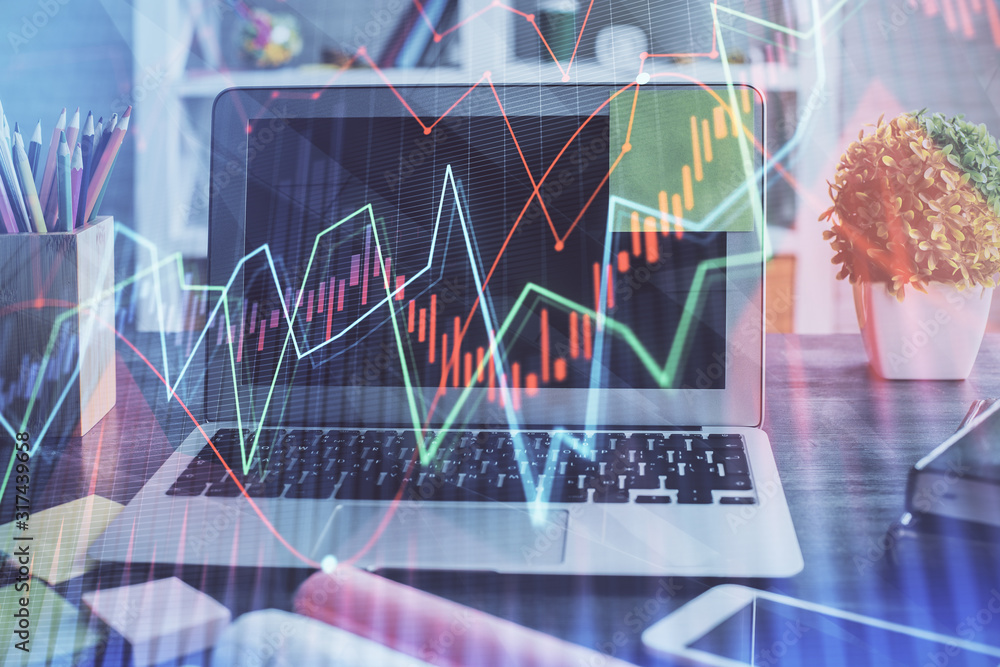 Financial market graph hologram and personal computer on background. Double exposure. Concept of forex. Financial market graph hologram and personal computer on background. Double exposure. Concept of forex.