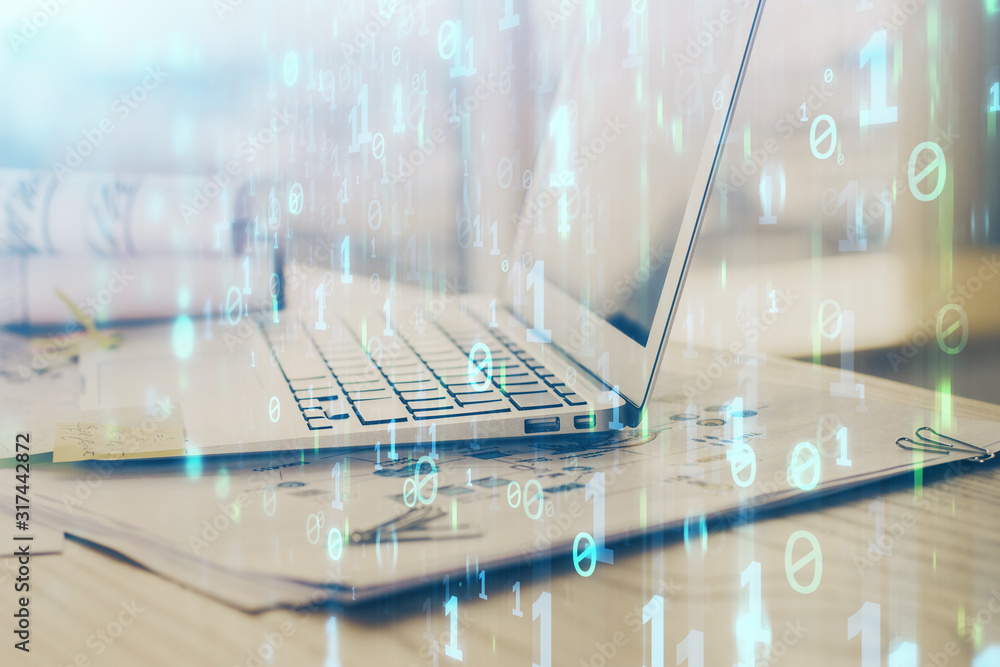 Double exposure of laptop computer and technology theme hologram. Concept of freelance work. Double exposure of laptop computer and technology theme hologram. Concept of freelance work.