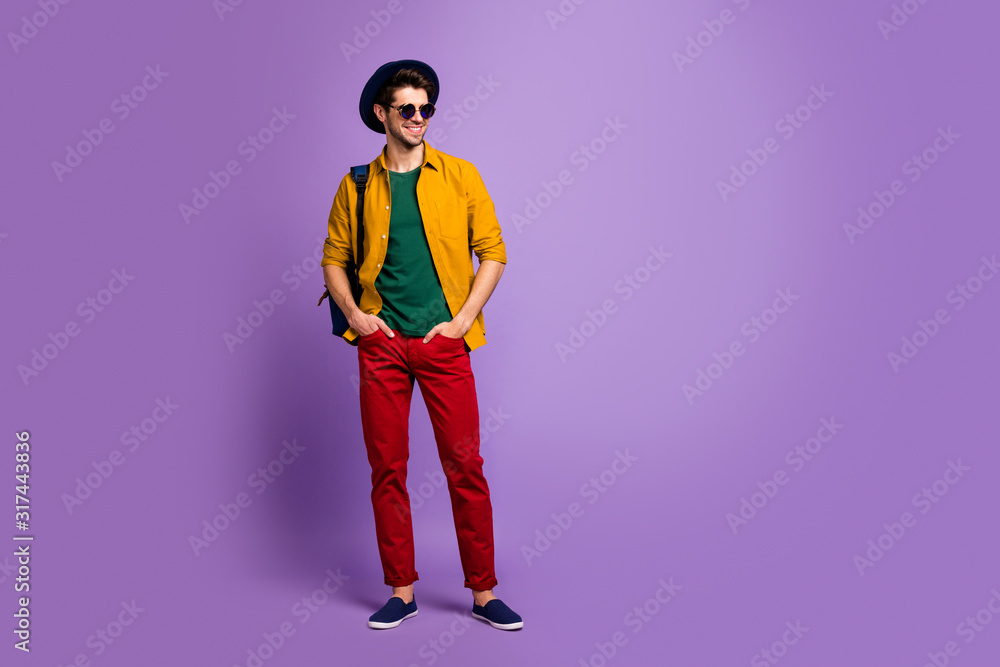 Full size photo of attractive gorgeous guy have spring walk holidays put hands in pockets wear blue bag velvet hat sunglass retro outfit isolated over purple color background - obrazy, fototapety, plakaty 
