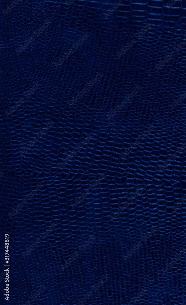 leather background textured with graining patterns toned in trendy Classic Blue color of the Year 2020 leather background textured with graining patterns toned in trendy Classic Blue color of the Year 2020