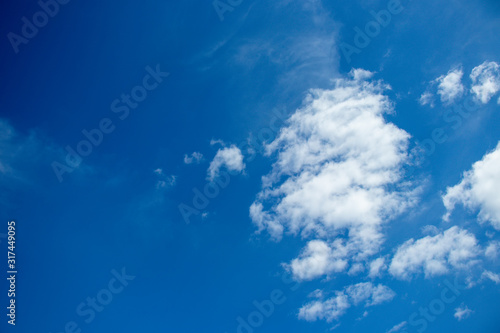 blue sky with white clouds © artem