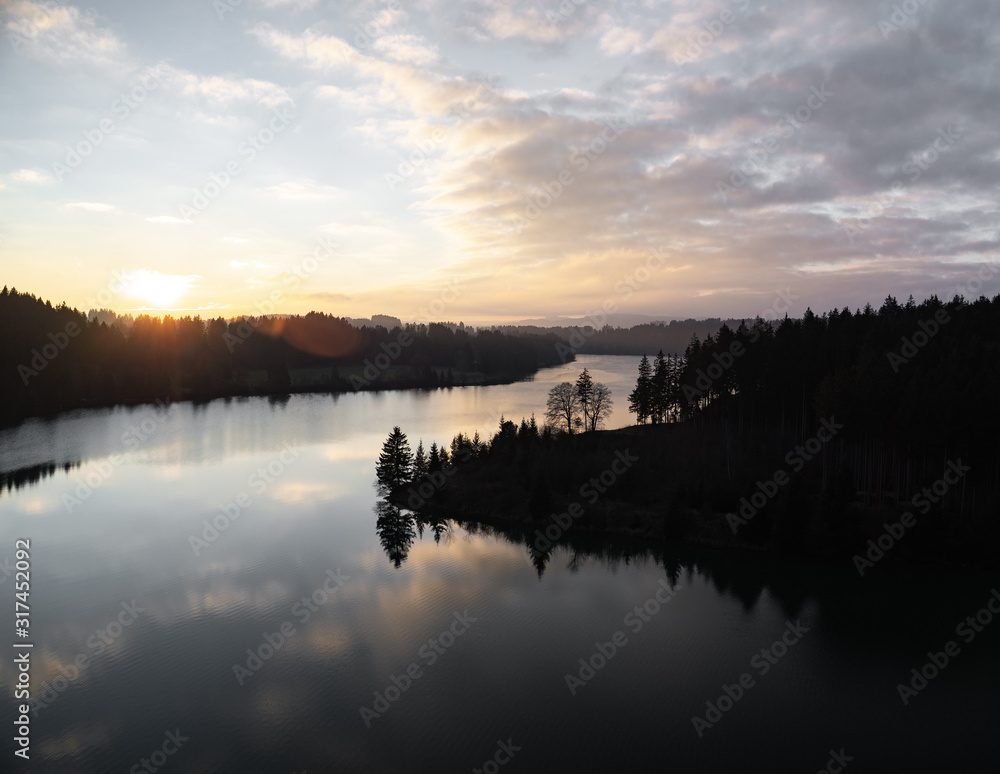 Sunset with reflection over river Lech in Bavaria, Germany