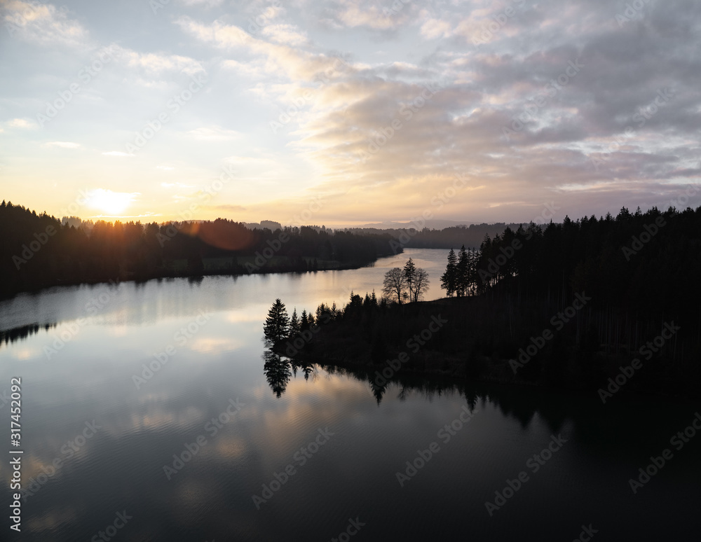 Obraz premium Sunset with reflection over river Lech in Bavaria, Germany