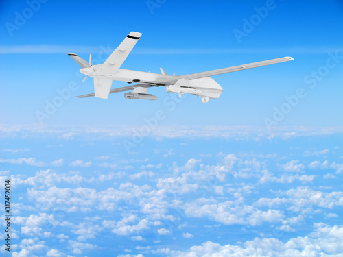 military UAV airplane drone flies against backdrop of beautiful clouds on blue sky background
