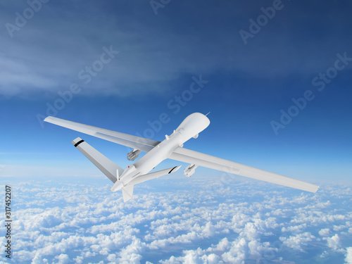 military RC military drone flies flies against backdrop of beautiful clouds on blue sky background