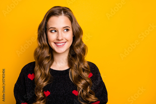 Close-up portrait of her she nice-looking attractive lovely pretty caucasian cheerful cheery wavy-haired girl looking aside brainstorming isolated on bright vivid shine vibrant yellow color background
