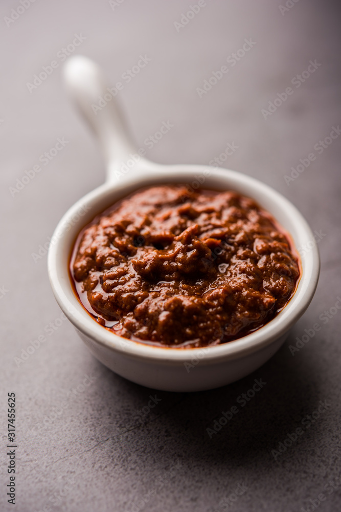 Homemade Tandoori Paste or Marinade mixture, in a bowl. used for grilled chicken or Paneer or vegetable. selective focus Homemade Tandoori Paste or Marinade mixture, in a bowl. used for grilled chicken or Paneer or vegetable. selective focus
