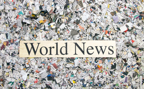 Newspaper confetti from above with the words World News