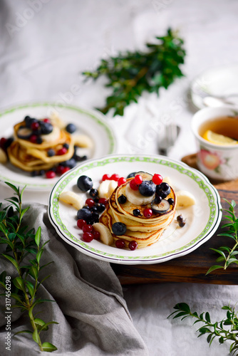 Gluten free pancakes with mixed berry.style vintage