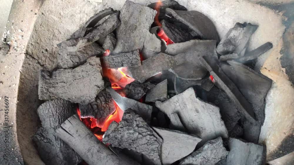 Start a fire Charcoal Burning,There is smoke from the burning tribe. Start a fire Charcoal Burning,There is smoke from the burning tribe.