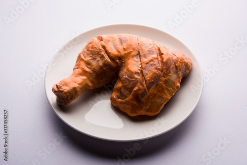 Homemade Tandoori Paste or Marinade mixture  in a bowl. used for grilled chicken or Paneer or vegetable. selective focus