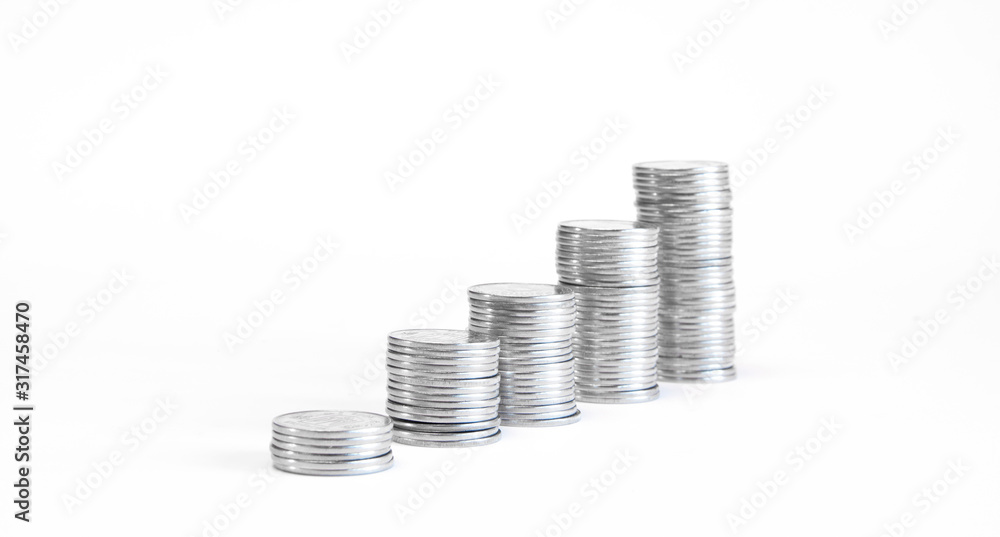 A stack of coins in ascending order. Profit growth concept. The economic growth. On white... A stack of coins in ascending order. Profit growth concept. The economic growth. On white...