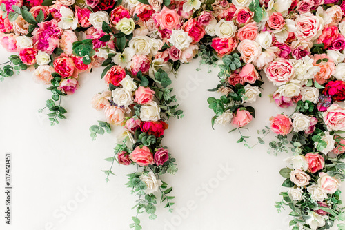 Fototapeta Naklejka Na Ścianę i Meble -  Flower pattern made of pink, beige roses flower buds on white background. Flat lay, top view.