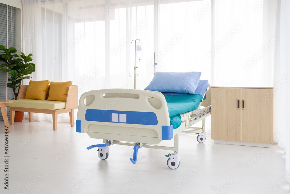 Empty bed in a hospital  and white hospital bed on white background.  Patient room and insurance concept. Stock-Foto | Adobe Stock