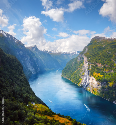 Fototapeta Naklejka Na Ścianę i Meble -  Breathtaking view of Sunnylvsfjorden fjord and famous Seven Sisters waterfalls, near Geiranger village in western Norway. Landscape photography