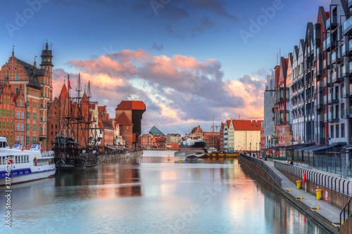 Beautiful scenery of the old town in Gdansk over Motlawa river at sunrise, Poland.