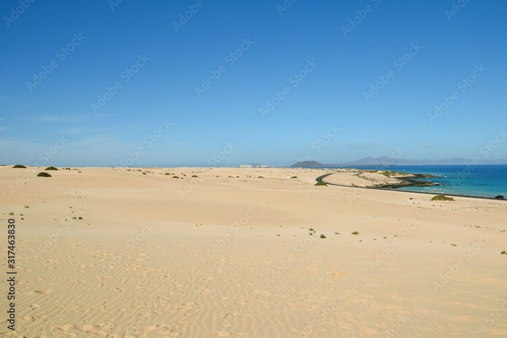 Sand dunes. Parque Natural de Corralejo at Fuerteventura, Canary Islands, Spain Sand dunes. Parque Natural de Corralejo at Fuerteventura, Canary Islands, Spain