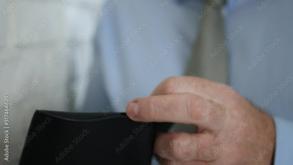 Disappointed Person Searching Cash in an Empty Wallet Disappointed Person Searching Cash in an Empty Wallet