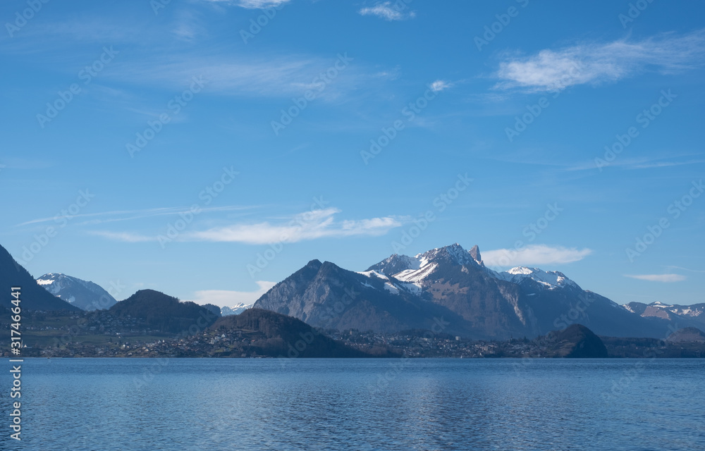 Lake Thun near the town of Spietz, Interlaken, Switzerland, photographed on a clear day whilst on a boat tour of the lake in mid winter.