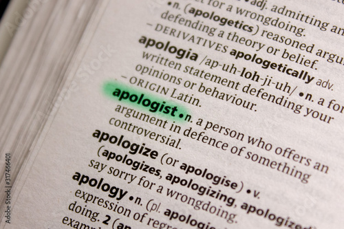 Apologist word or phrase in a dictionary. photo